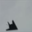 Low-resolution airplane image from the CIFAR-10 dataset
